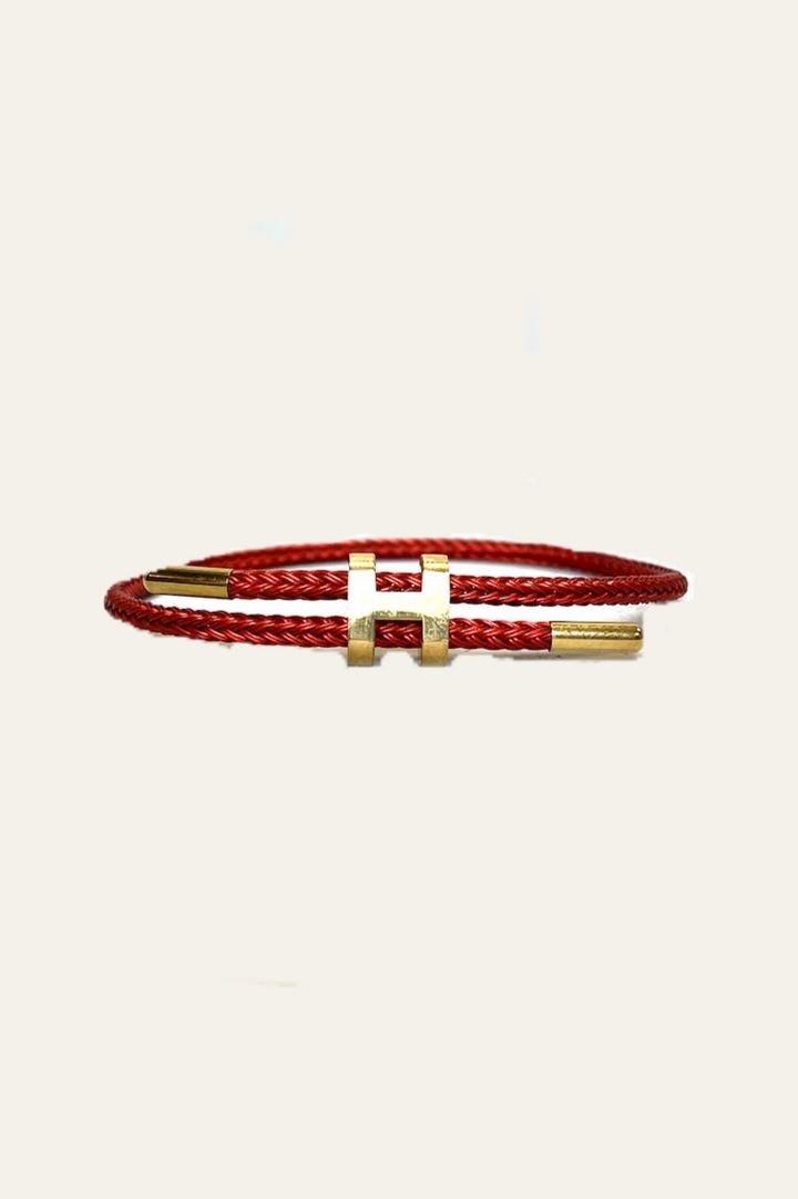 Armband mit goldener H-Schließe